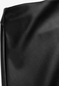 Stretchig kjol i skinnimitation Klänningar & Kjolar|Plus Size
